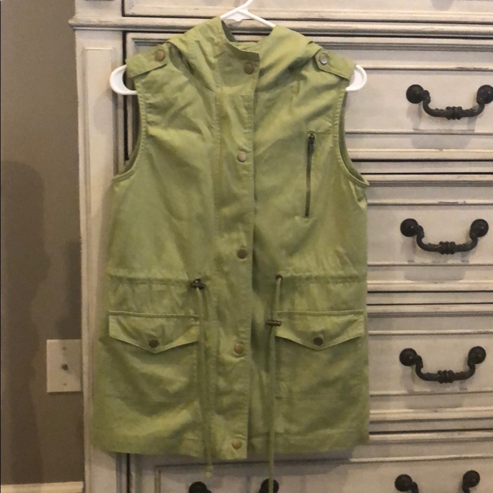 Gently used utility vest—Very good used condo on